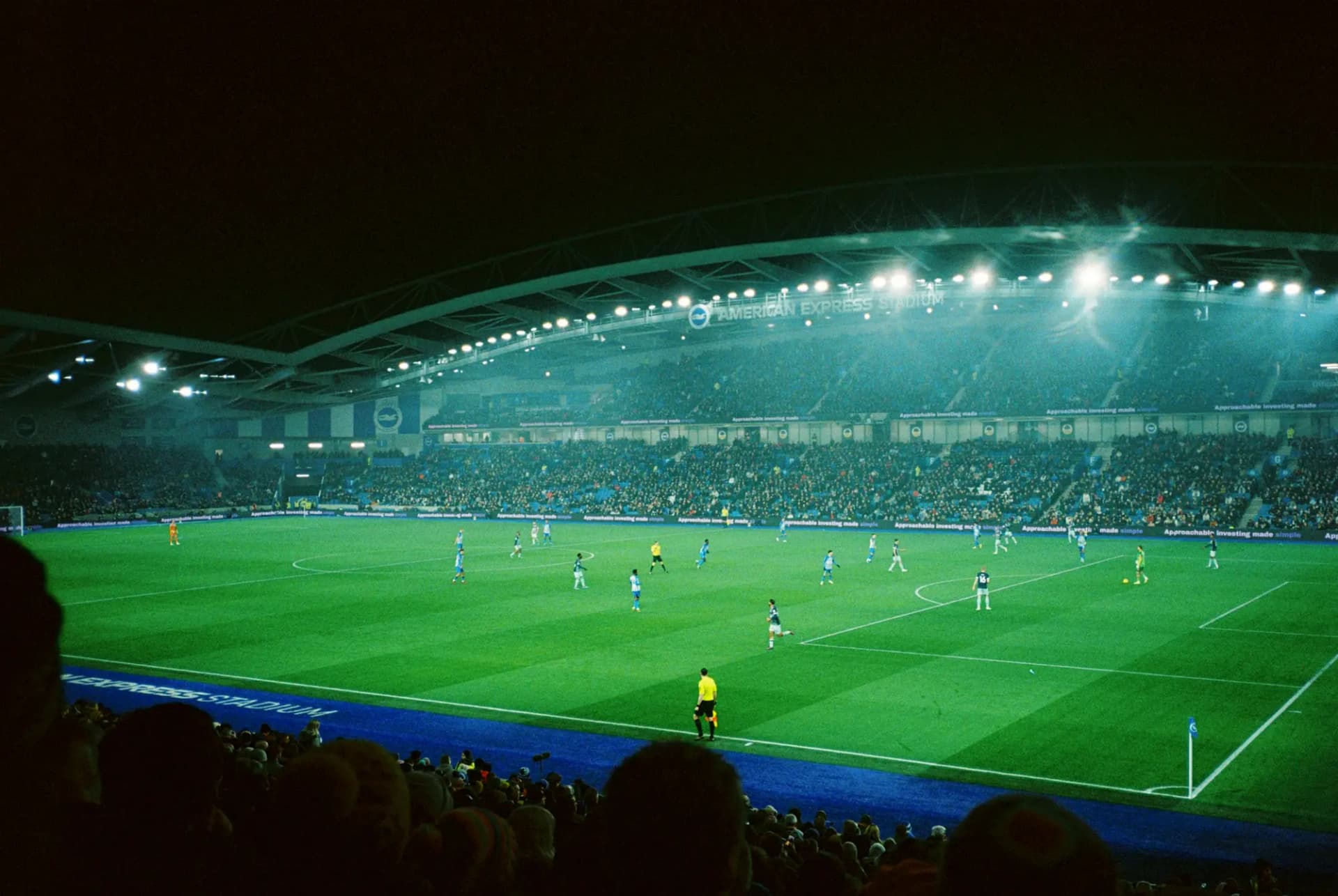 Football match under floodlights